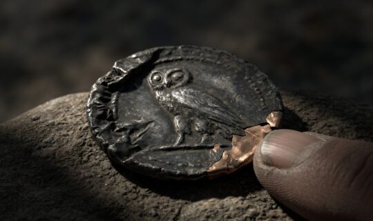 worn ancient counterfeit silver coin